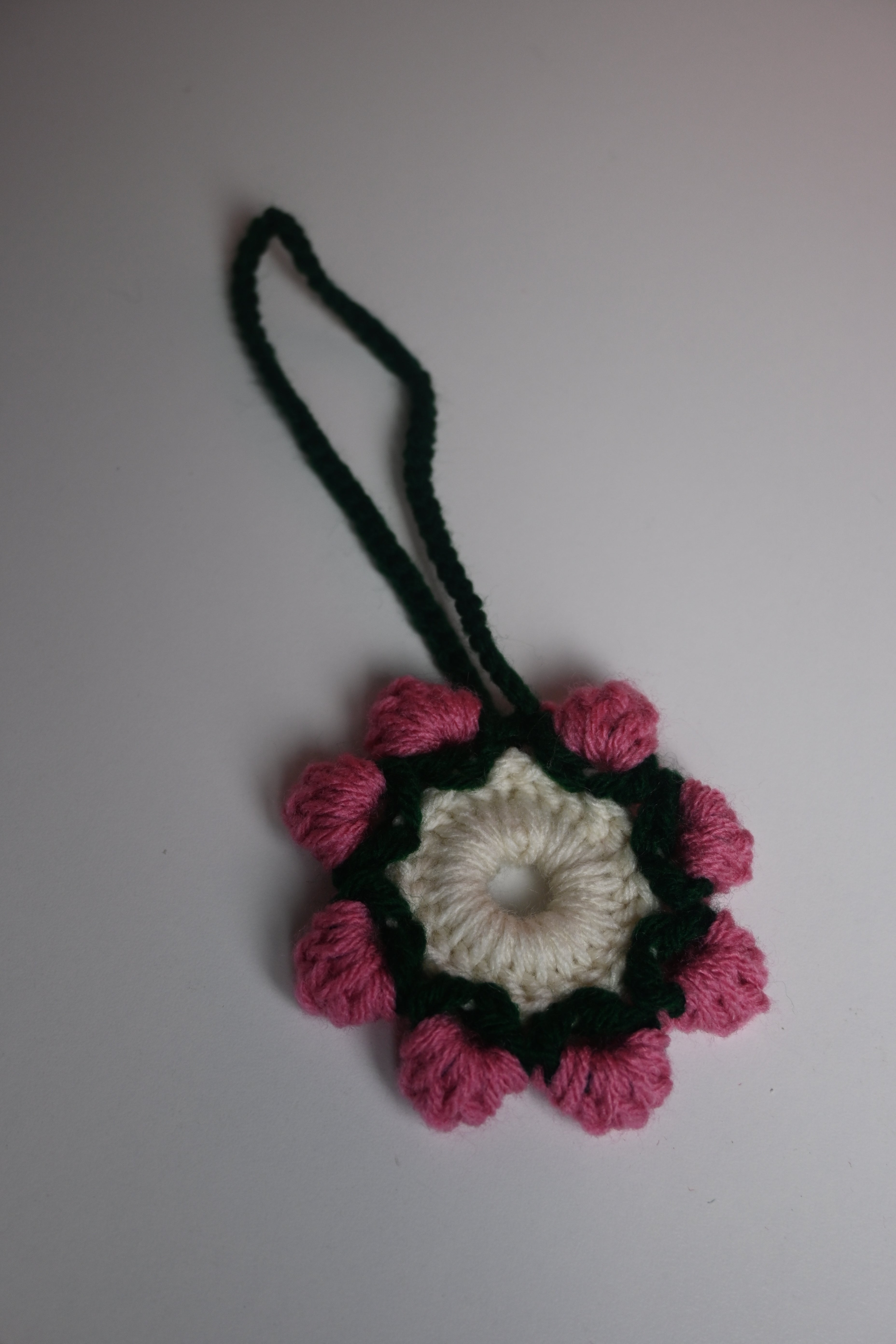 “Purple handmade crochet car accessory floral style”
