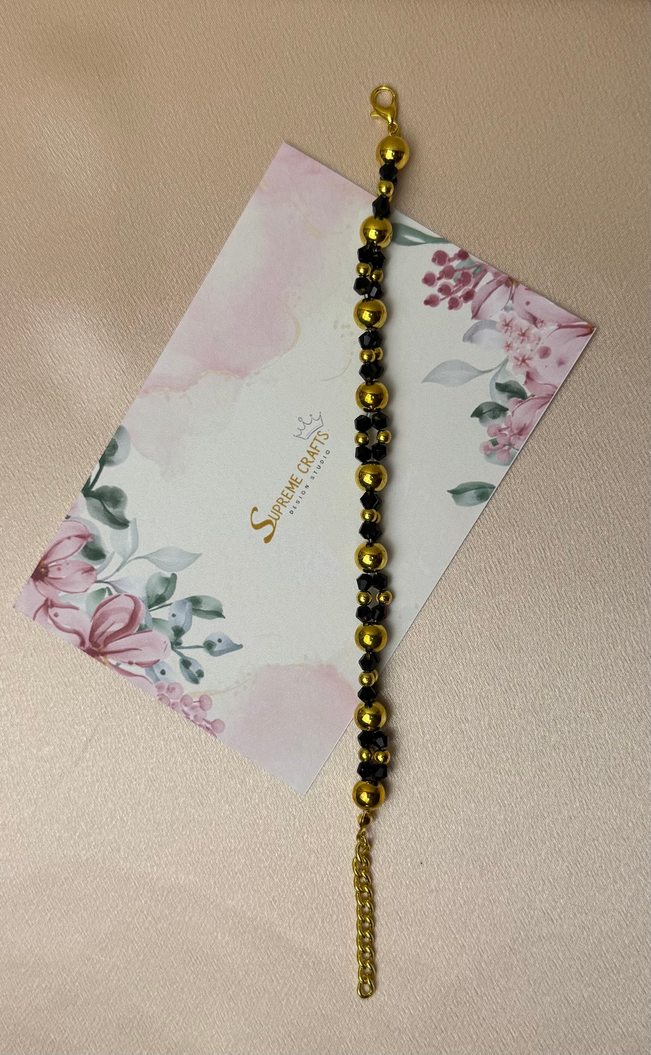 Gold and black beaded necklace.